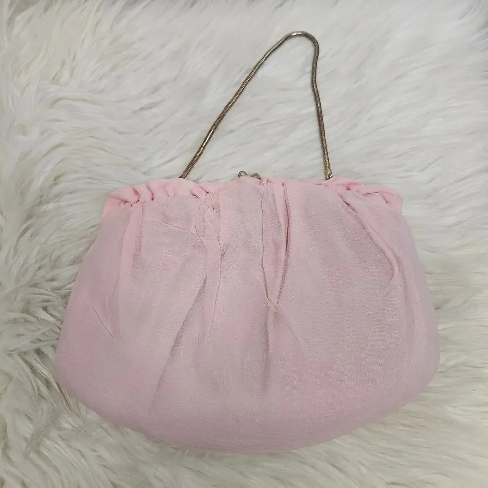 Harry Levine ruffled handbag wear
